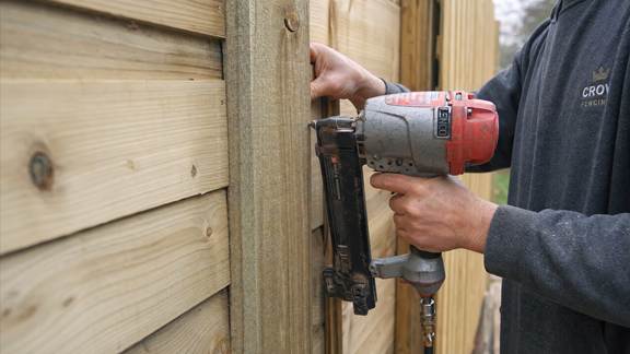 Best Nail Gun & Nails for Fencing Buying Guide 5 Nail Gun Actively Working on Fencing